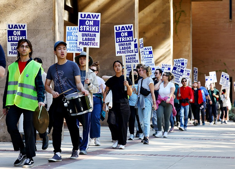 Union academic workers and supporters march at the UCLA campus amid a statewide strike at University of California.