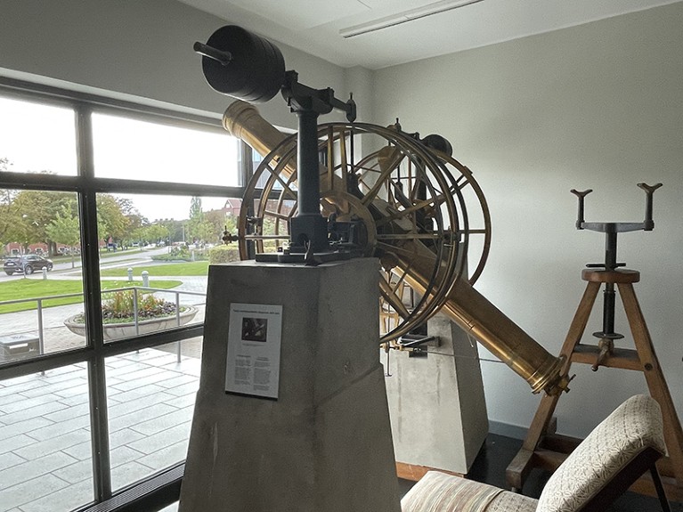 A old telescope on display at the Lund Observatory.