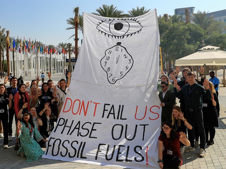 Climate activists attend a protest against fossil fuels at Dubai's Expo City during the United Nations Climate Change Conference COP28 in Dubai.