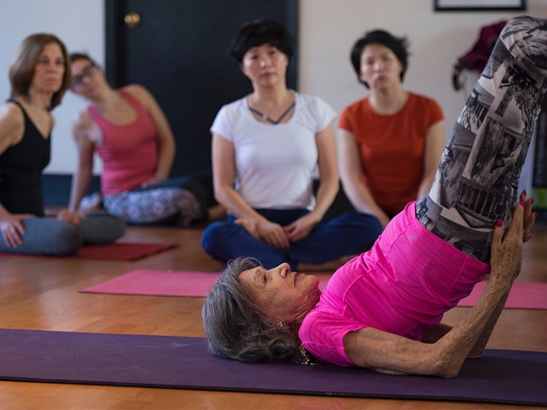 Yoga Master Tao Porchon-Lynch instructs a yoga class in Hartsdale, New York.