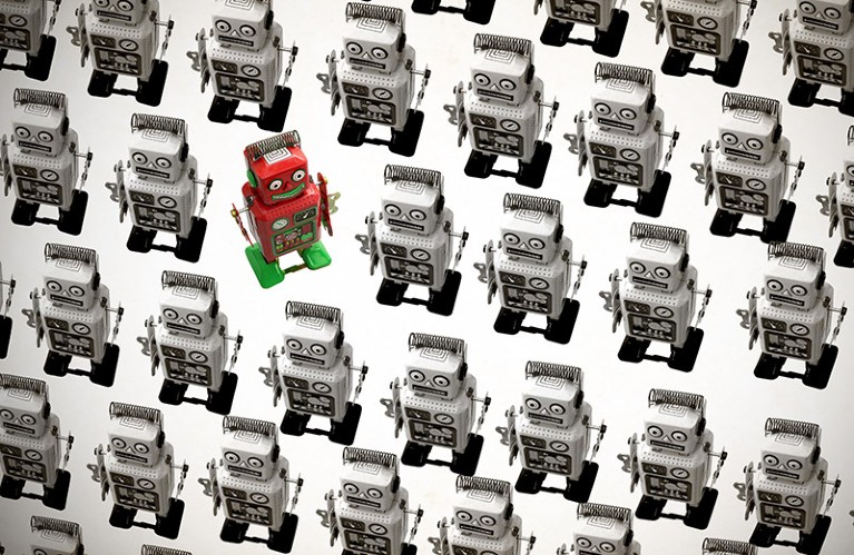 A happy red robot goes a different direction against lines of many identical robots.