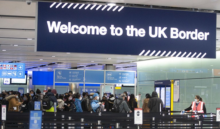 People queue at UK border control at Terminal 2 at Heathrow Airport on February 11, 2021 in London, England.