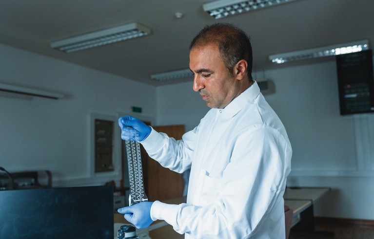 Mahmoud Tavakoli, Associate Professor at Electrical Engineering Department of University of Coimbra in Portugal, in his Soft and Printed Electronics Laboratory stretching an ultrathin electronic film.