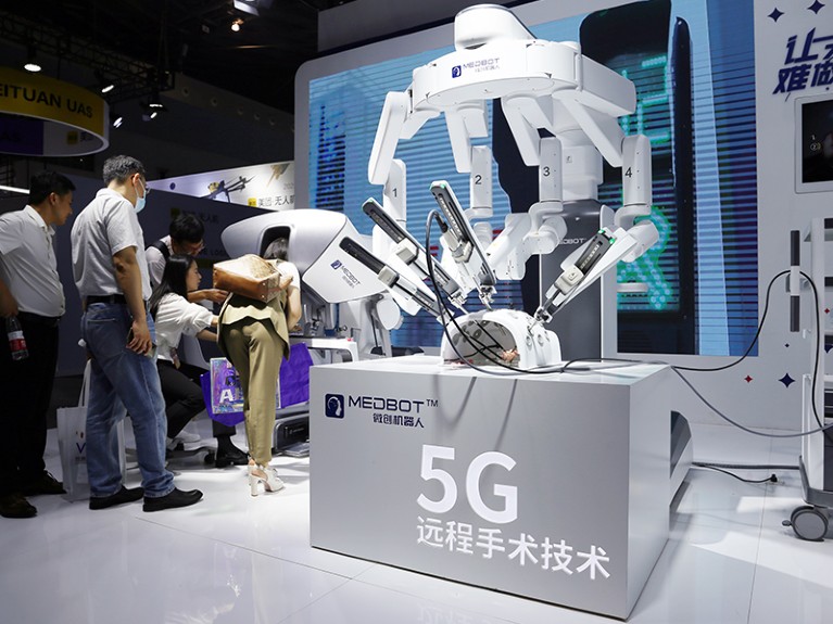 Minimally invasive robots demonstrate 5G remote surgery technology at the 2023 World Artificial Intelligence Conference in Shanghai, China, July 8, 2023.