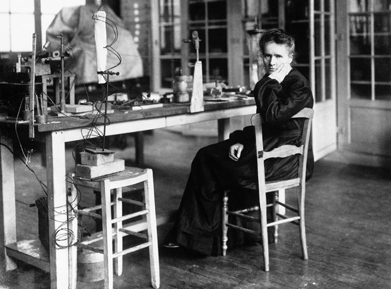 Marie Curie (1867 - 1934) photographed in her laboratory.