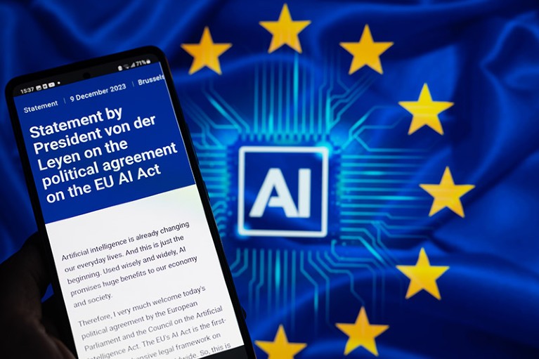 The statement from the European Commission is being displayed on a smartphone with AI and EU stars in the background.