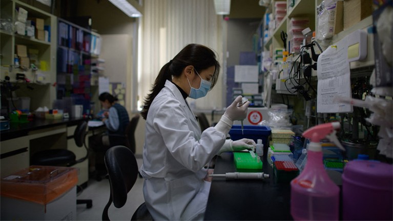 A lab technician working on a neutralising antibody test on the Middle Eastern Respiratory Syndrome (MERS) coronavirus at a Bio Safety Level (BSL) 3 laboratory at the International Vaccine Institute (IVI) in Seoul.