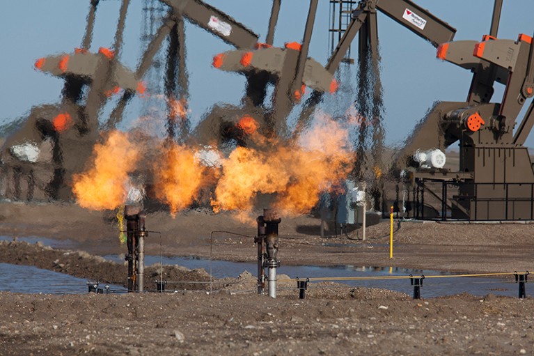 Natural gas is flared off as oil is pumped in the Bakken shale formation in North Dakota, U.S.