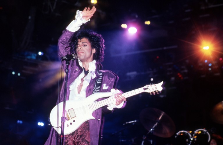 Prince performs onstage during the 1984 Purple Rain Tour