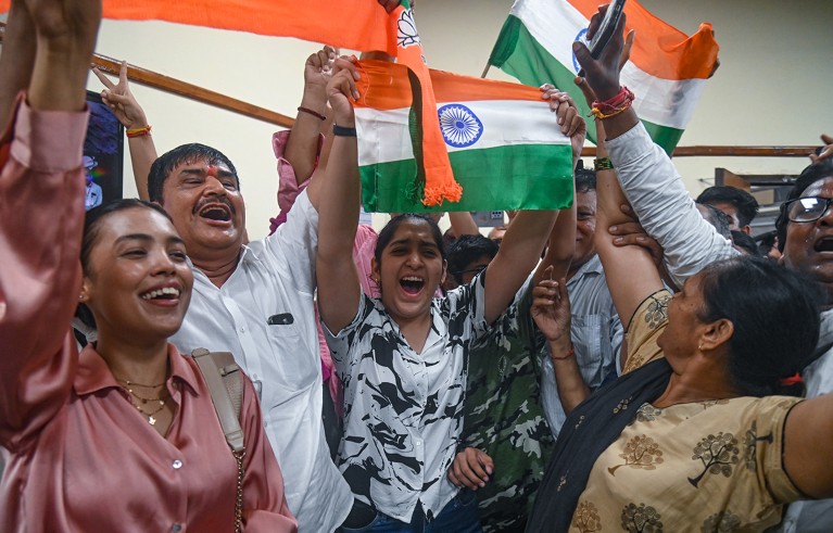People cheer as they celebrate the successful landing of Chandrayaan 3 mooncraft on the south pole of the Moon, in New Delhi, India on August 23, 2023.