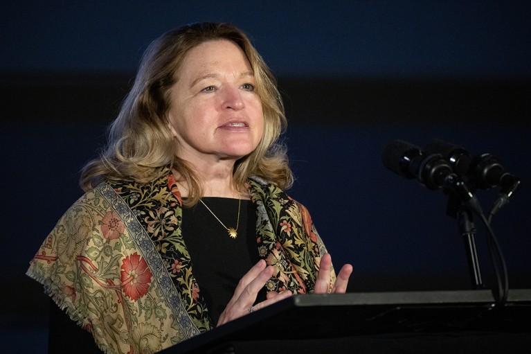 Ellen Stofan speaking at a podium at the Smithsonian’s National Air and Space Museum in Washington, DC, U.S.