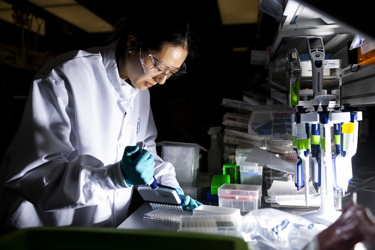 A researcher works in the lab at the Moderna Inc. headquarters.