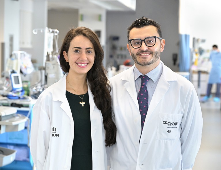 Dr. Arielle Elkrief and Dr. Bertrand Routy stand in a laboratory setting