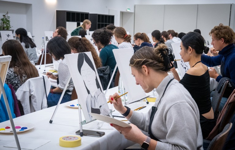 Students painting.