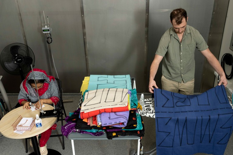 Participants recreate conditions in a garment factory in a climate chamber