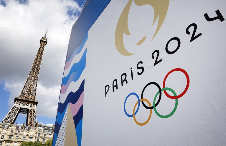 The Paris 2024 logo representing the Olympic Games displayed near the Eiffel Tower.