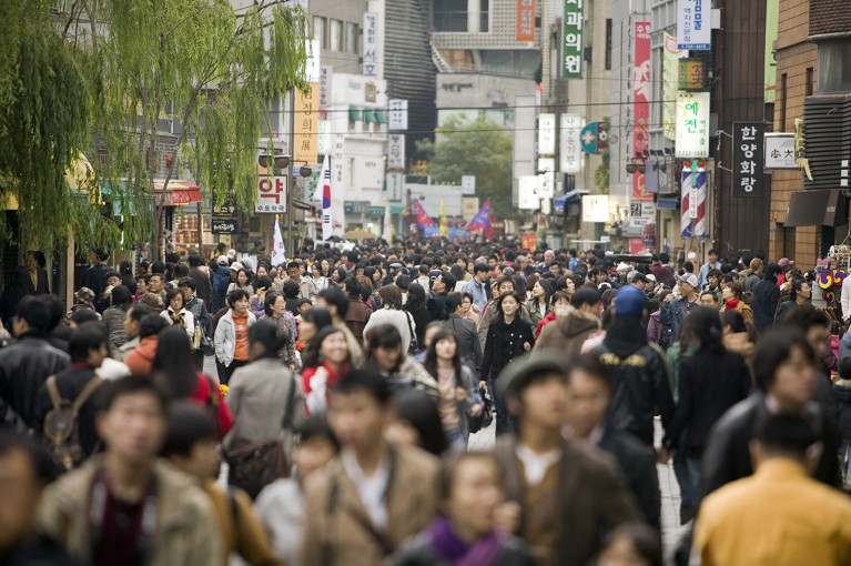 Insadong Street in Seoul, South Korea is filled with many people walking around.