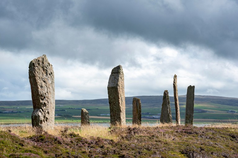 Large, vertically positioned stones arranged in a ring make up the Ring of Brodgar, a Neolithic stone monument on Orkney