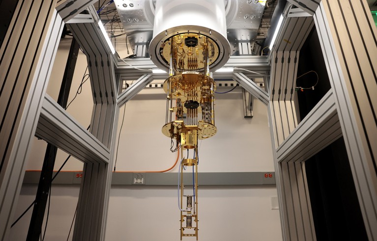 A close up view of a cryogenic dilution refrigerator inside Amazon's quantum networking lab.