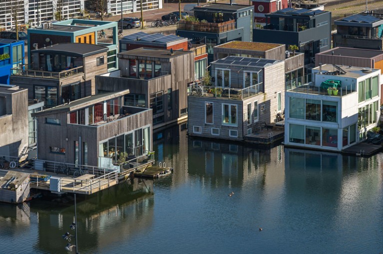 Modern houses in the Ijburg neighbourhood in Amsterdam-Oost appear to float on the water