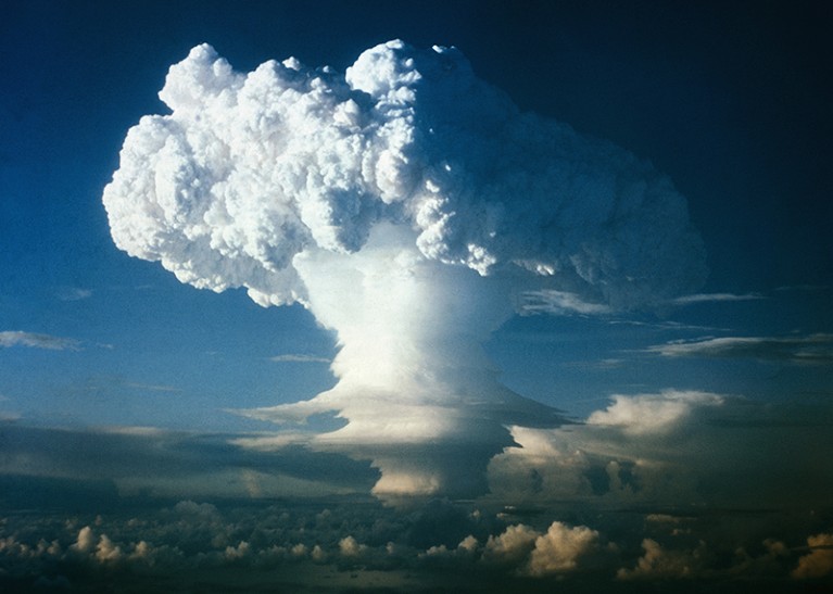 A plume of smoke is seen in the air as nuclear device Ivy Mike is detonated in the Marshall Islands.