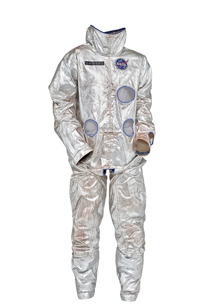 A silver NASA spacesuit cover-layer