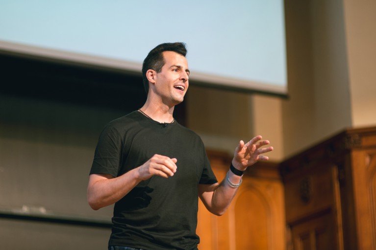 Closed-up of David J. Malan speaking during a lecture