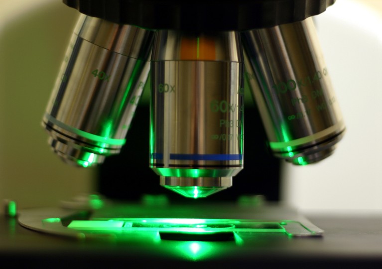 Close-up on the objective lenses of a fluorescence microscope