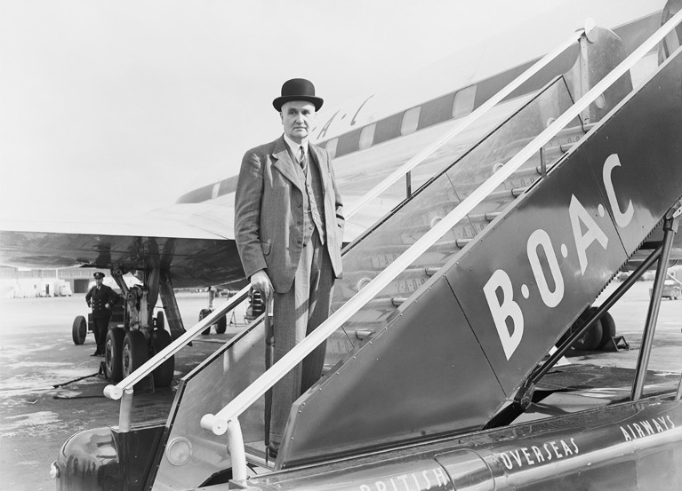 English physicist and Paymaster-General Frederick Lindemann boards a plane at London Airport, 16th September 1953.