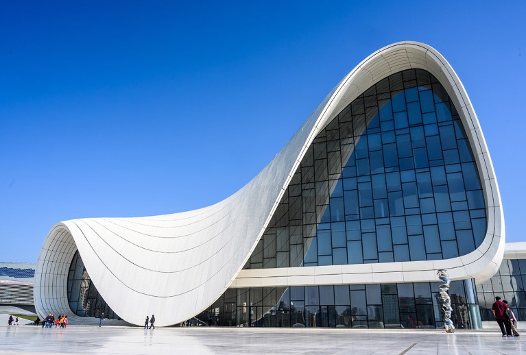 People walk in front of the Heydar Aliyev Center in Baku.