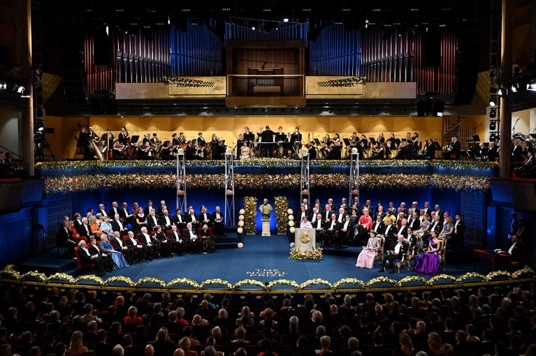 A general view shows members of the Swedish Royal family (R), the Nobel Prize laureates and guests attending the 2023 Nobel awards ceremony.