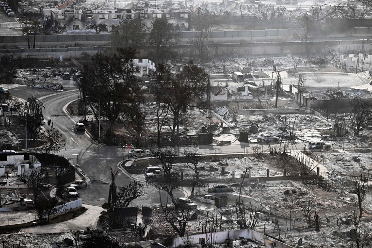 An aerial photo shows destroyed homes and buildings burned to the ground in Lahaina after fires in western Maui, Hawaii.