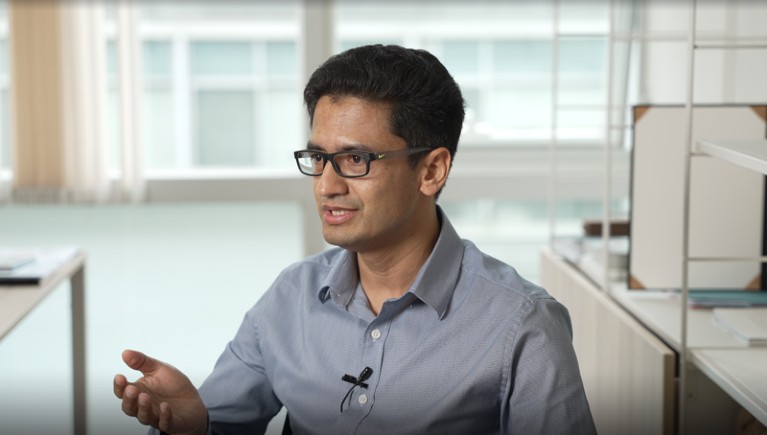 Rajendra Karki talking in the lab