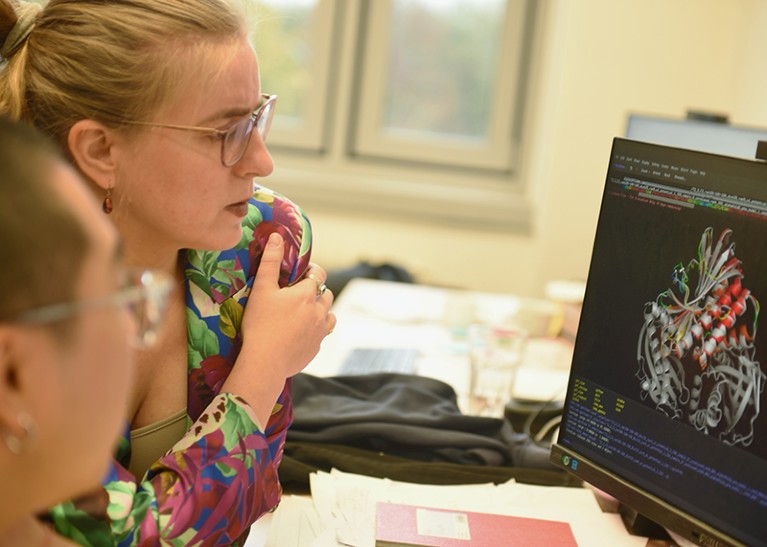 Alena Khmelinskaia is seen looking at her computer