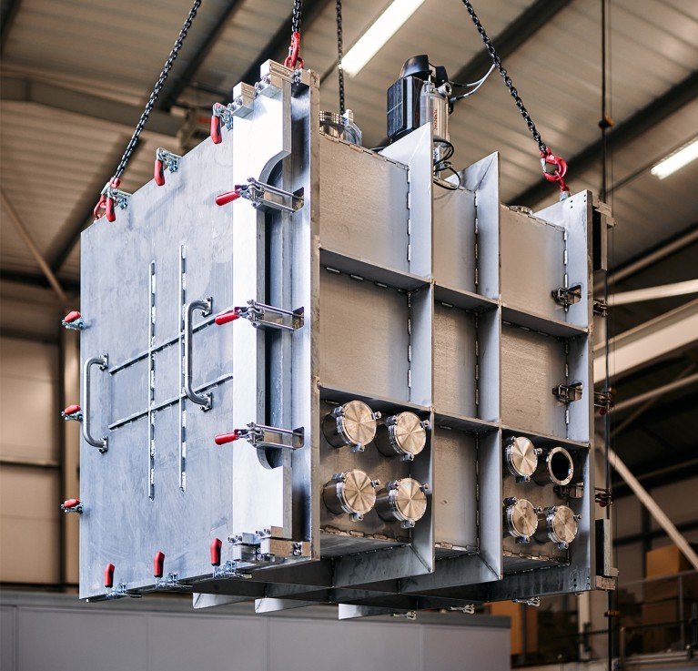 PsiCube, PsiQuantum's prototype cryogenic cabinet which is installed at PsiQuantum's facilities in Daresbury, UK and is the intermediate system upon which PsiQuantum's recent silicon photonic results were yielded from.