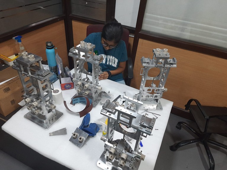 Richal is seen sitting at a table working in the Inter-University Center for Astronomy and Astrophysics LIGO-India lab.