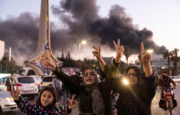 Citizens in Damascus celebrate after Assad fled the country and Damascus was taken over by the National Syria Army.