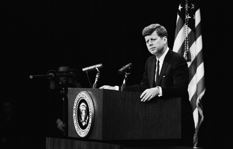 President John F. Kennedy fielding a question at a press conference, in Washington.