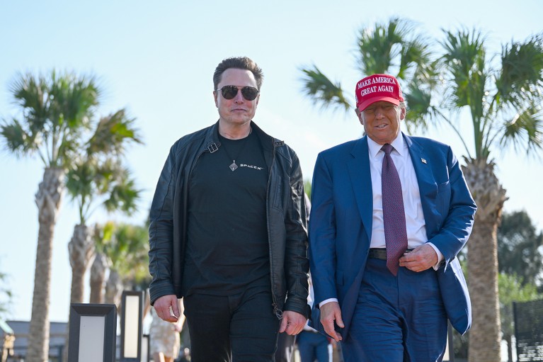 U.S. President-elect Donald Trump walks with Elon Musk to attend a viewing of the SpaceX Starship rocket in Texas, U.S.