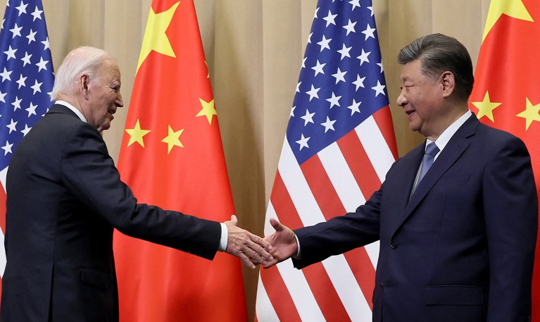 U.S. President Joe Biden shakes hands with Chinese President Xi Jinping ahead of a summit in 2024.