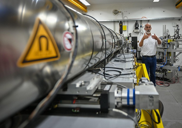 Christian Stegmann, Director of DESY in Zeuthen and Professor of Astroparticle Physics at the University of Potsdam, stands at a particle accelerator from the Helmholtz Association research center DESY (Deutsches Elektronen-Synchrotron).