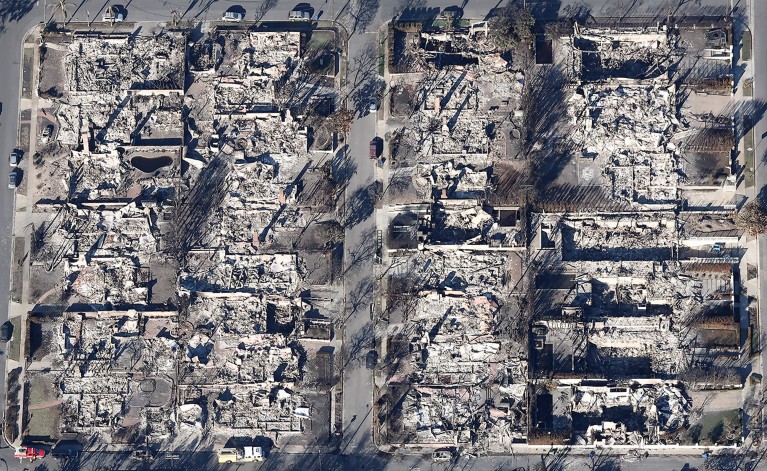 An aerial view of a fire truck near homes destroyed in the Palisades Fire in the Los Angeles area of the U.S.