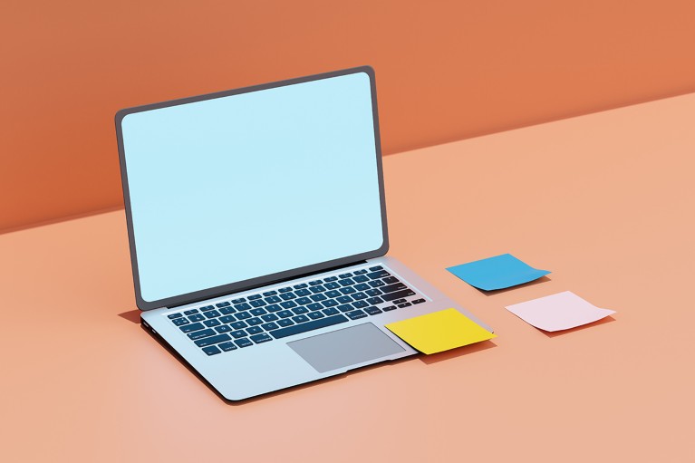 A laptop sits on an orange background with one sticky note attached to it, and two next to it.