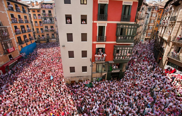 Thousands of people crowd into the streets of Pamplona, Spain to celebrate the Festival of San Fermin.