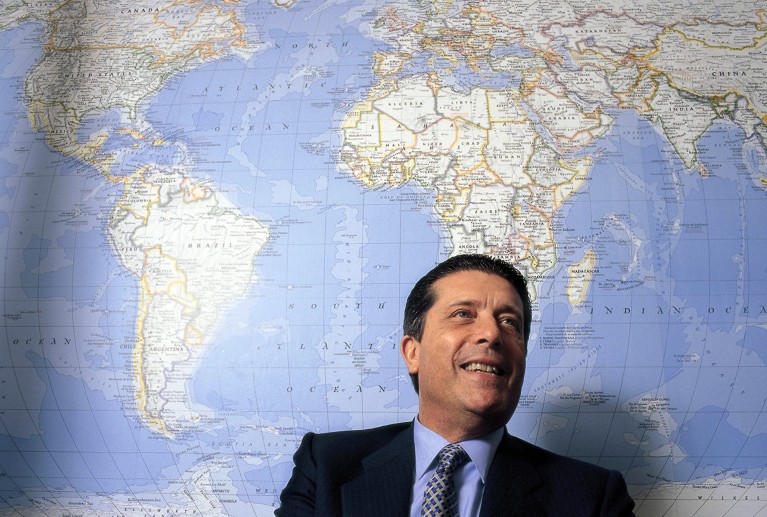 Federico Mayor Zaragoza, general secretary of the UNESCO in front of a global map, 2006.