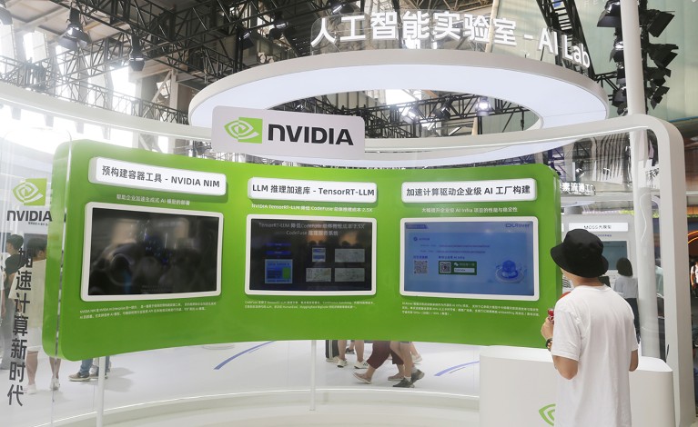 Visitors explore the NVIDIA booth at a tech trade show in Shanghai, China in 2024.