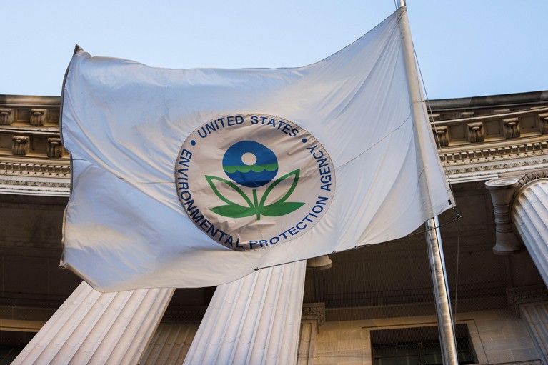 The EPA flag flying in front of the Environmental Protection Agency Headquarters in Washington DC.