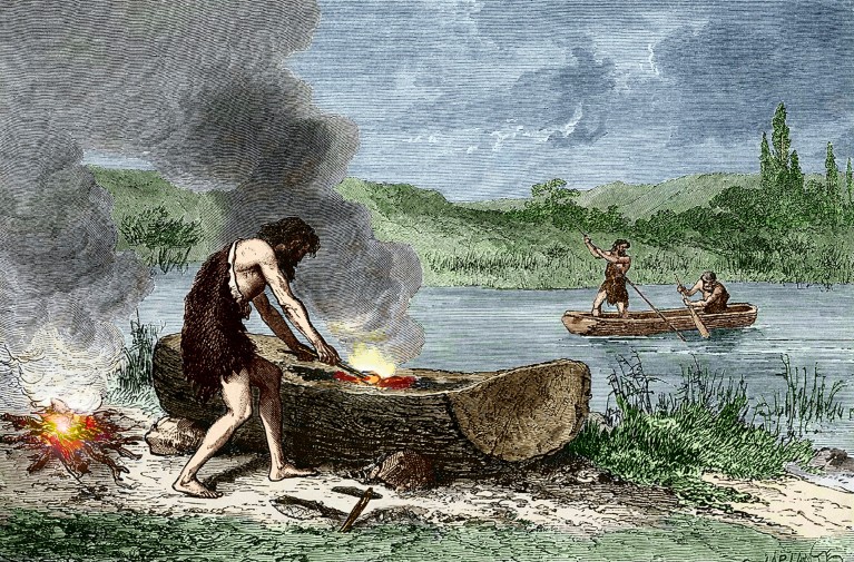 Illustration of early humans during the Stone Age, using using fire to hollow out a tree trunk to form a dugout canoe.