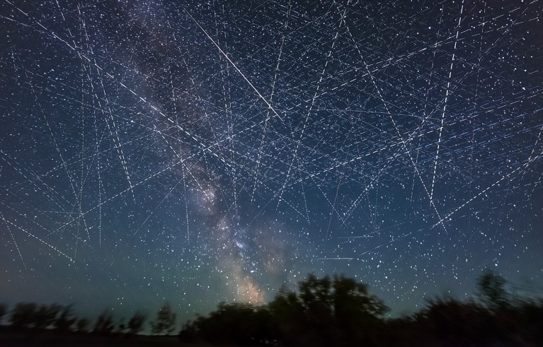 Parallel streaks heading generally horizontal west to east (right to left) may be from groups of SpaceX Starlinks in a night sky..