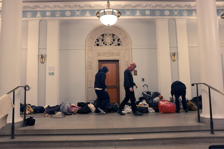 Demonstrators from the pro-Palestine encampment barricade themselves inside Hamilton Hall at Columbia University.